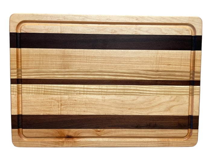 Montana Block Company 14x20 flat cutting board with juice groove, made of durable wood for kitchen prep and chopping tasks.