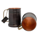 Antique copper tankard mug from Butte Copper Company, featuring a classic hammered finish and sturdy handle for barware use.