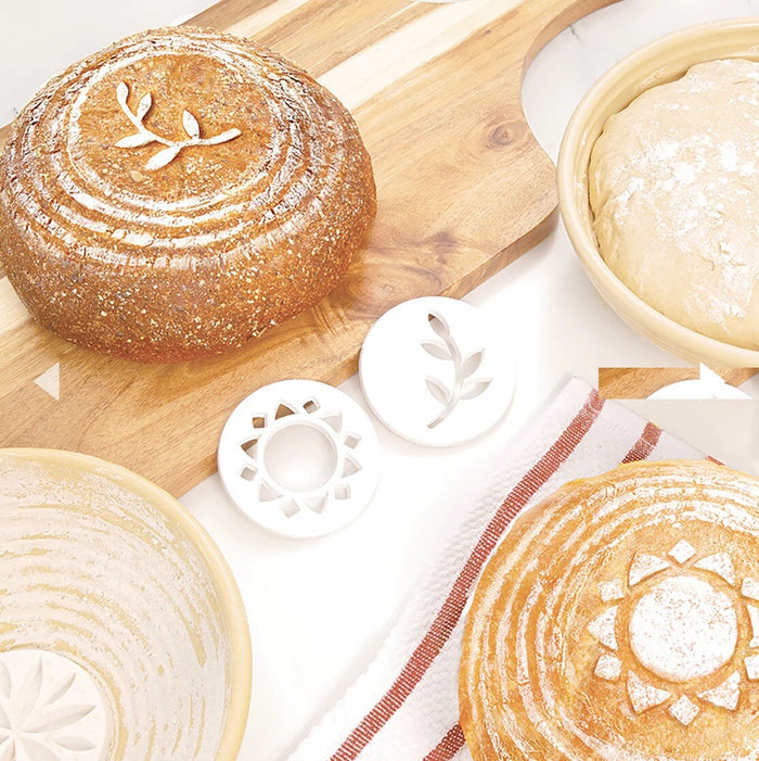 Set of two Harold Imports bread embossers with intricate designs for baking projects, shown on a neutral background.