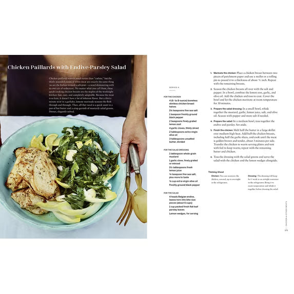 French Dinner Cookbook by Penguin Random House LLC featuring pages with classic French recipes and elegant dish presentations.
