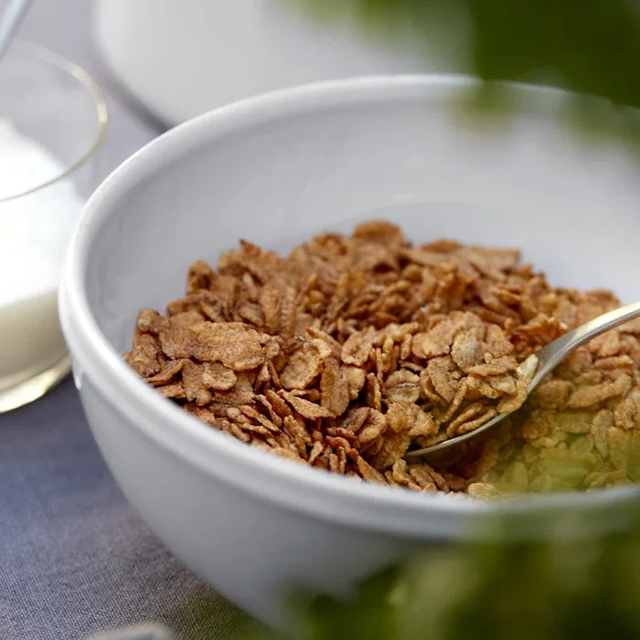White Friso cereal bowl from Costa Nova's 2201 dinnerware collection, showcasing a smooth, rounded ceramic design.