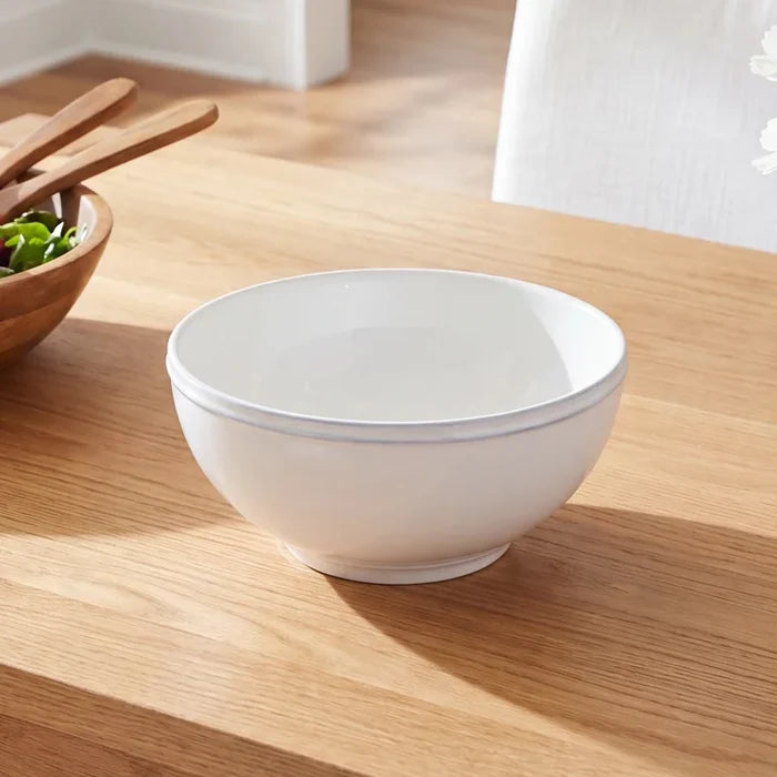 White Costa Nova Friso cereal bowl from the 2201 dinnerware collection, showcasing a smooth, rounded ceramic design.