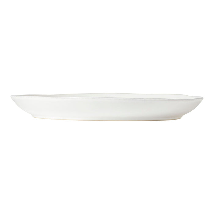 White 11-inch Livia dinner plate from Costa Nova's 2201 dinnerware collection, showcasing a smooth ceramic surface.