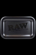 Overhead view of the RAW Logo Rolling Tray displaying the brand's logo centered on its metallic surface.