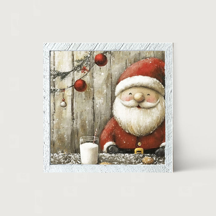 Santa enjoying Cookies and milk